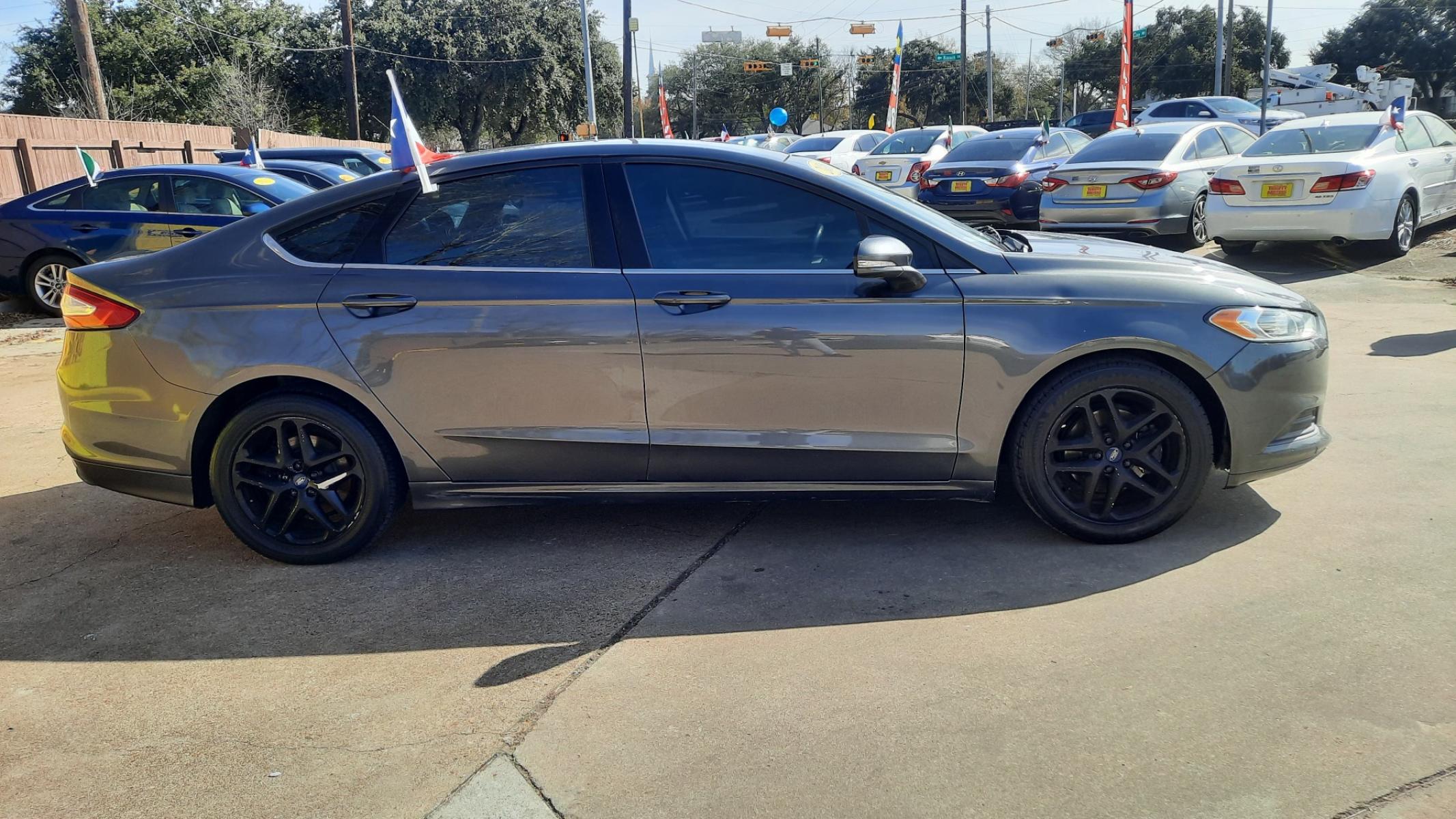 2016 Ford Fusion (3FA6P0H71GR) , located at 16710 Clay Rd., Houston, TX, 77084, (281) 859-7900, 29.834864, -95.656166 - Photo #0